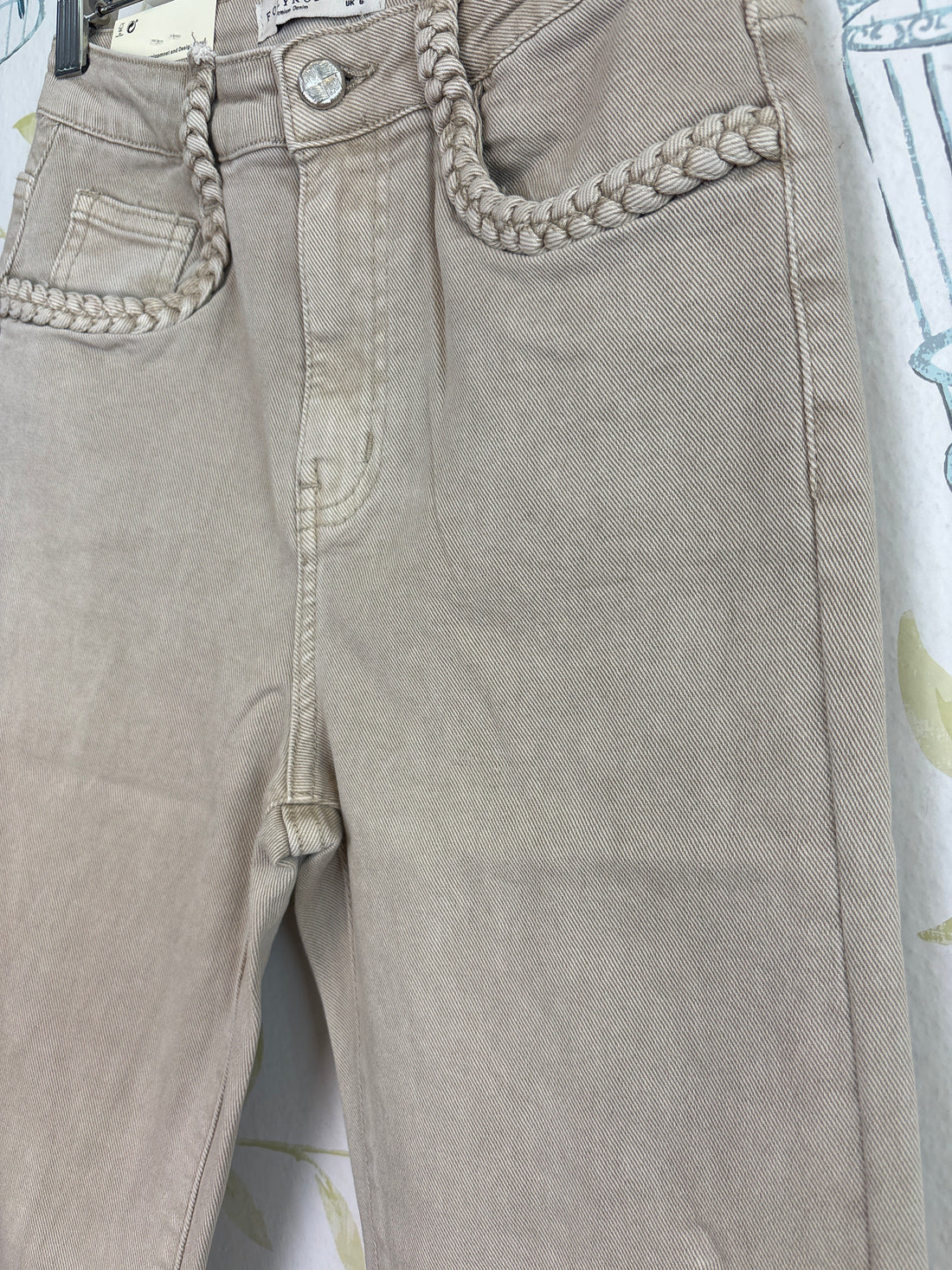 Pantalón Flared Trenza